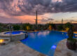 Custom gunite pool with above ground spill over hot tub built by 1st Choice Pools in Tucson